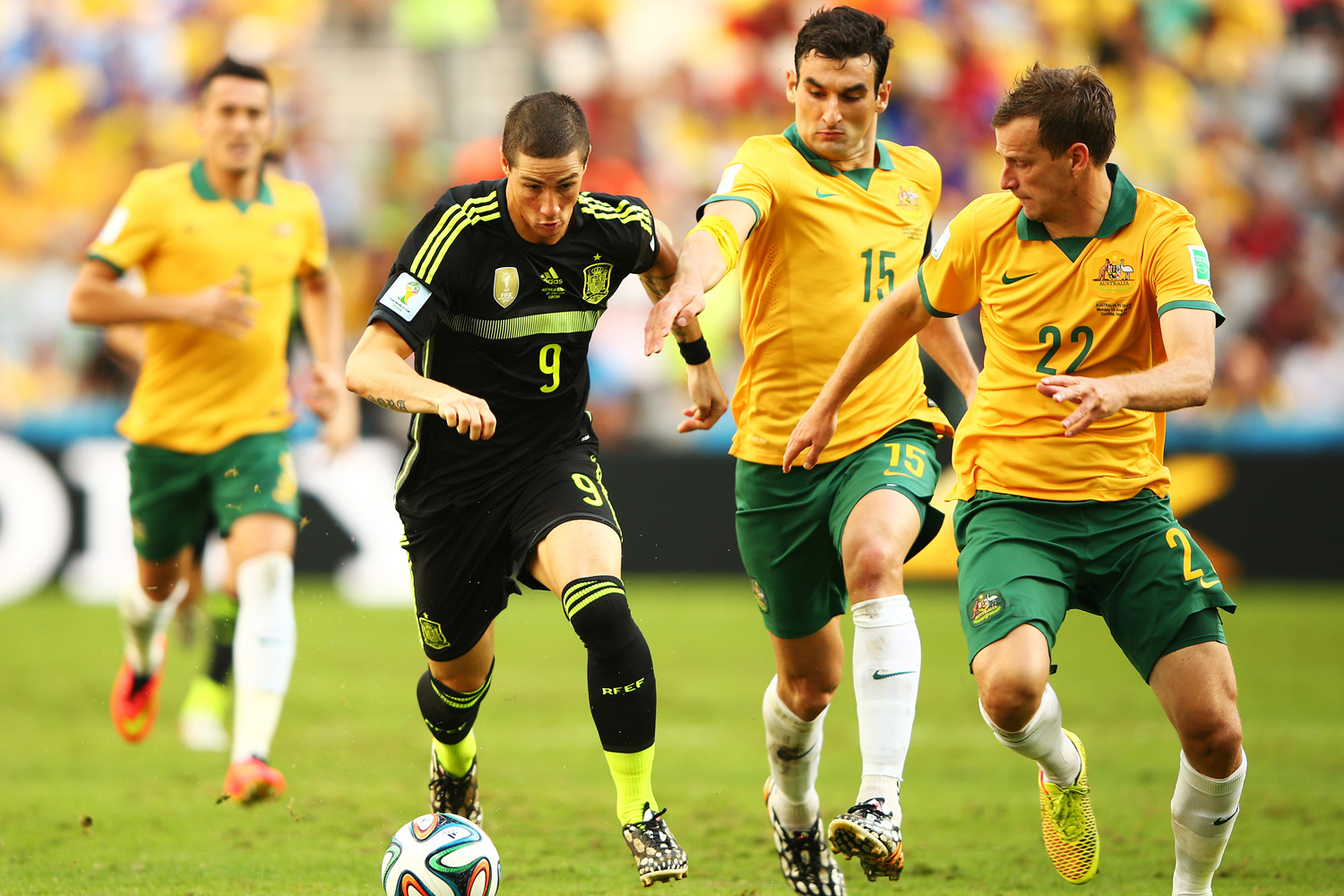 Alex Wilkinson Challenges Fernando Torres At FIFA World Cup 2014